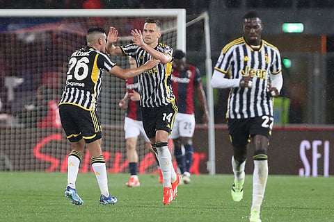 Arkadiusz Milik celebrates scoring a goal